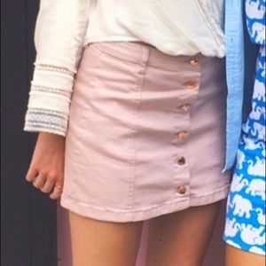Pink button up mini skirt